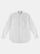 The POCKETPARACHUTE® Shirt by gabrielstunz boasts a premium fabric with a modern fit, featuring a white, long-sleeve button-up design, a mandarin collar, and a left chest pocket set against a plain light background.