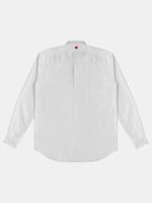 The image displays the back of a gabrielstunz POCKETPARACHUTE® Shirt, featuring a modern fit and a small orange triangle logo at the upper center. This long-sleeve white shirt is made from premium fabric and includes buttoned cuffs and a pointed collar, set against a plain white background.