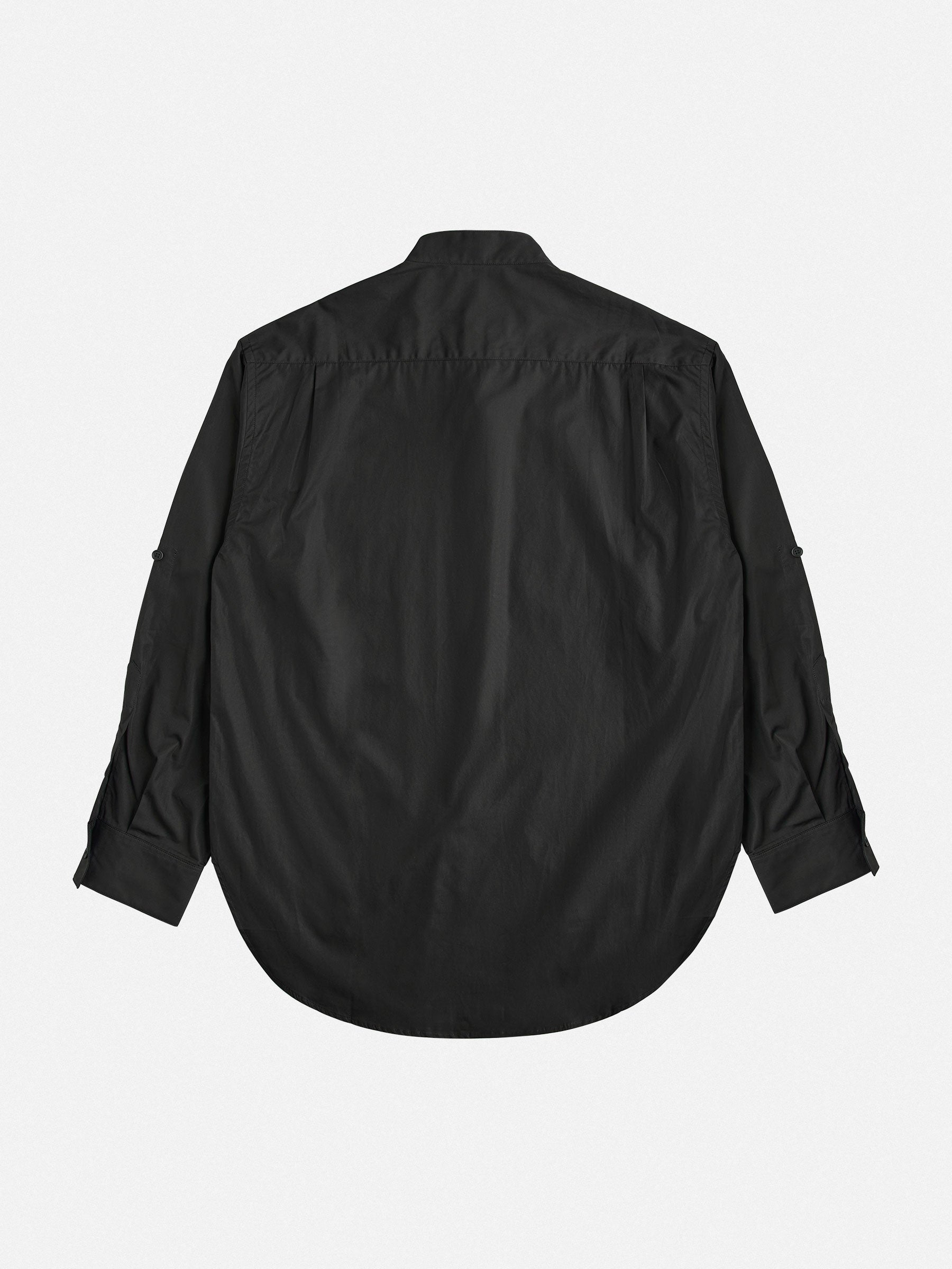 An Oversized Cotton Shirt by gabrielstunz, viewed from the back, exhibits European craftsmanship with its long sleeves and classic collar. Laid flat against a white background, it showcases its premium cotton fabric.