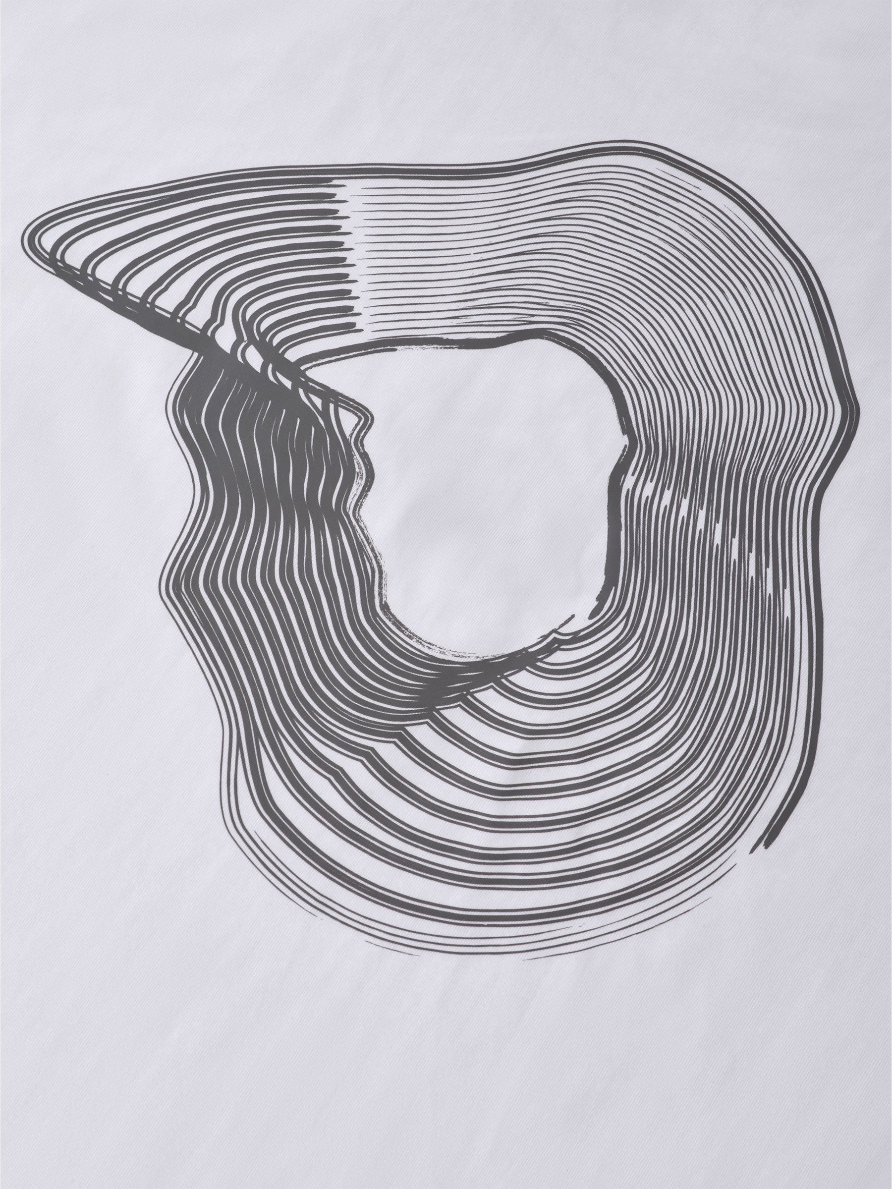 This oversize heavyweight T-shirt by gabrielstunz features a vortex print with abstract concentric curving lines, forming an irregular shape on a gray background. The varying line thickness creates movement and depth, reminiscent of fluid artwork.