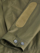 mesh elbow patches and button tab detail on raincoat