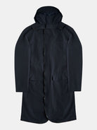 The POCKETPARACHUTE® Tech Raincoat by gabrielstunz in dark navy includes a hood, long sleeves, and front pockets. Made with innovative fabric, it provides the convenience of being packable. Displayed laid flat on a light gray background, the raincoat highlights its full length and front design details.