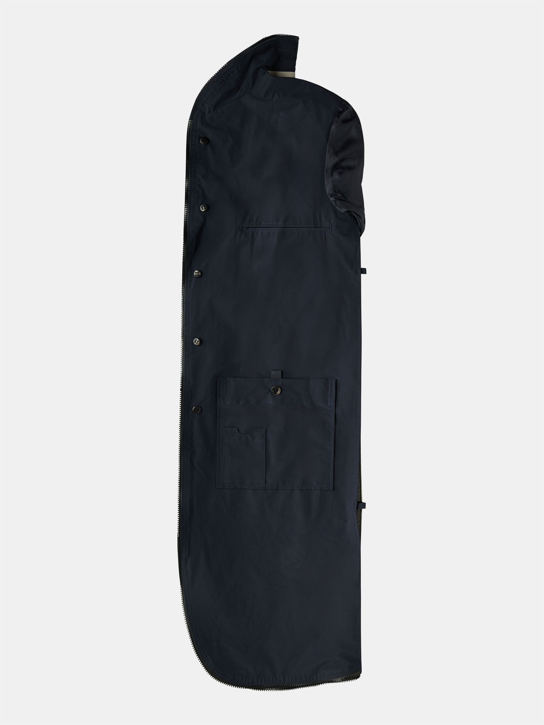 A black POCKETPARACHUTE® Tech Raincoat by gabrielstunz, designed with buttons for closure, is laid flat on a white background. It features a front pocket and a curved bottom edge, specifically designed for storing and protecting clothing. Its innovative fabric offers packable convenience, making it an ideal choice for travel.