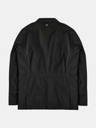 A black jacket from gabrielstunz, known as The Original POCKETPARACHUTE®, is showcased against a plain background. It sports a minimalistic design with a small orange and blue triangular logo located near the neckline on the back. This packable convenience jacket features long sleeves and a straight-cut hem, making it ideal for an on-the-go style.